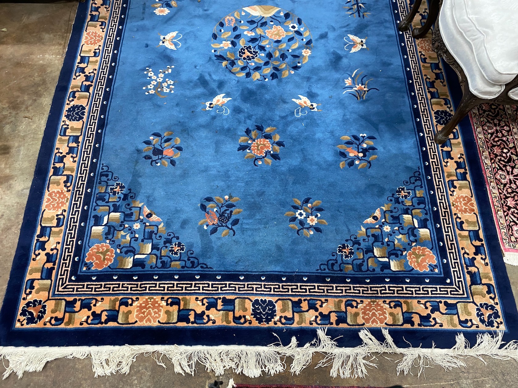 A Chinese blue ground carpet, 300 x 200cm